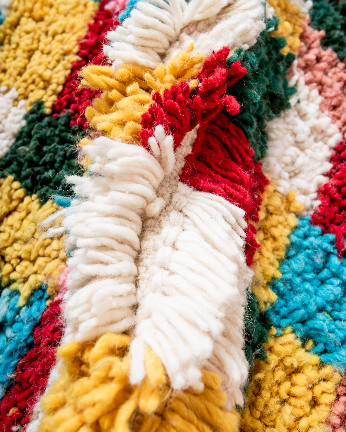 odern, designer, handcrafted Berber rug from Morocco. Beniourain carpet with beautiful colours and patterns and fluffy wool texture.